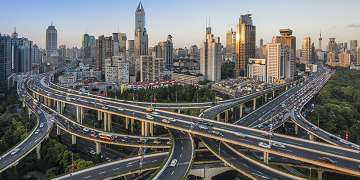 Multi-lane highways leading into a city.